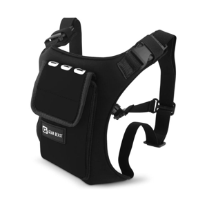 A black Gear Beast harness with adjustable straps features a front pocket and openings for headphone cords, designed for carrying essentials while on the go.