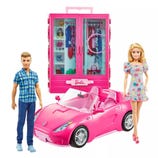 Doll set featuring a blonde female doll, a male doll in a blue plaid shirt, a pink convertible car, and a wardrobe closet with various outfits and accessories inside.