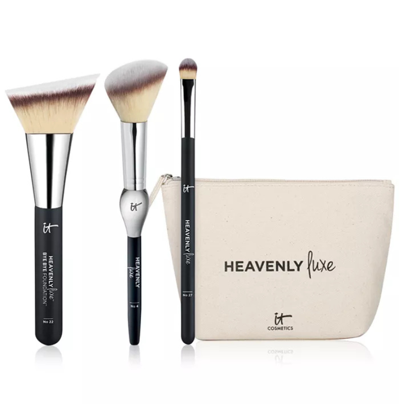 Makeup brush set including three brushes from \“Heavenly Luxe\“ by IT Cosmetics, accompanied by a branded zippered pouch.