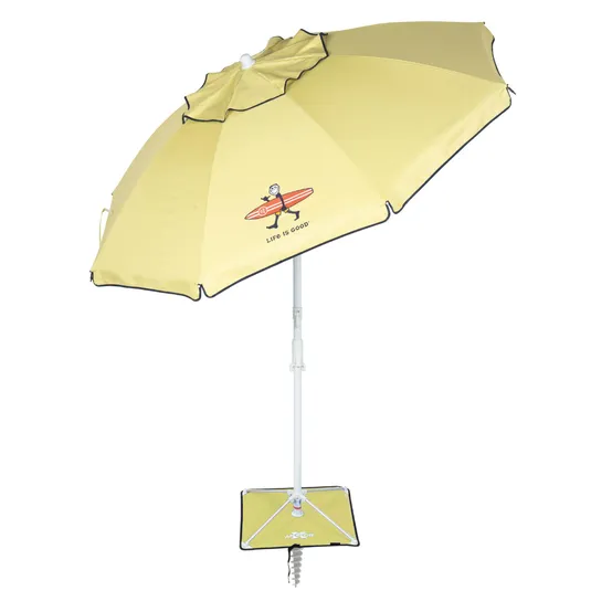 A yellow beach umbrella featuring a stick figure with a surfboard and the phrase \“Life is Good,\“ with a spiral anchor and base support.