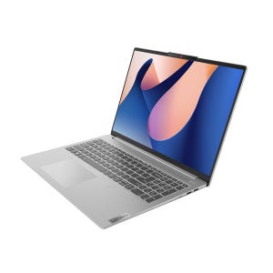 Lenovo laptop with a large screen and minimal bezels, featuring a full-size keyboard and a gray finish.