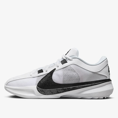 White Nike Giannis Freak 5 shoes with a black Nike swoosh and a geometric pattern on the heel area. They feature a mid-top design and black accents.