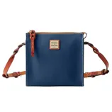 A blue Dooney & Bourke pebble leather crossbody bag with a square shape, tan braided strap, and tan zipper pull with a logo patch on the front.