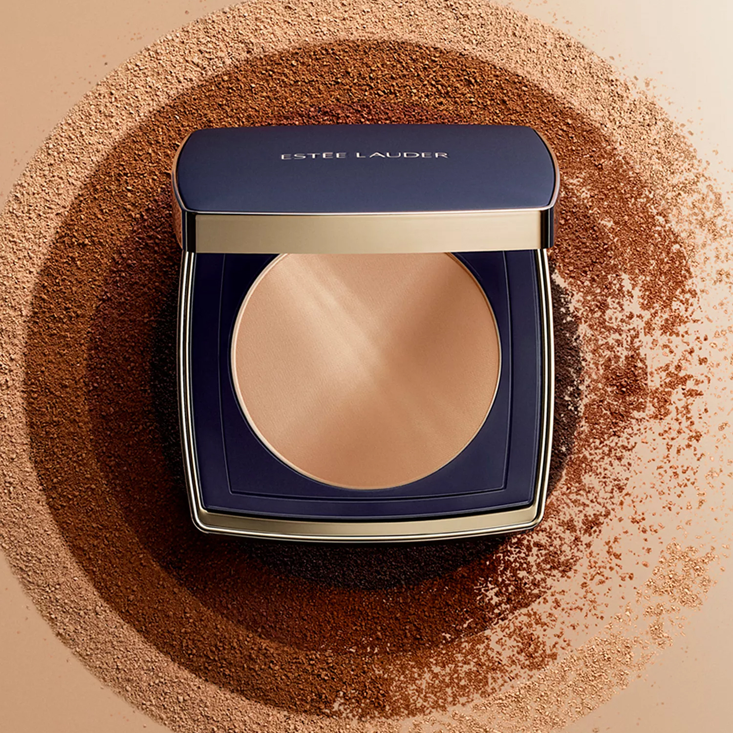 Estee Lauder powder compact set against a backdrop of varying powder shades in a circular pattern, highlighting its color and finish.