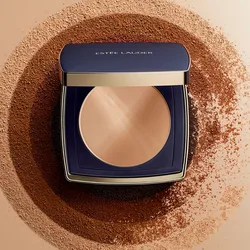 Estee Lauder powder compact set against a backdrop of varying powder shades in a circular pattern, highlighting its color and finish.