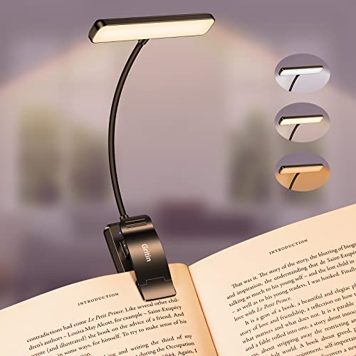 LED book light with adjustable neck and clip, featuring three color temperature settings for reading.