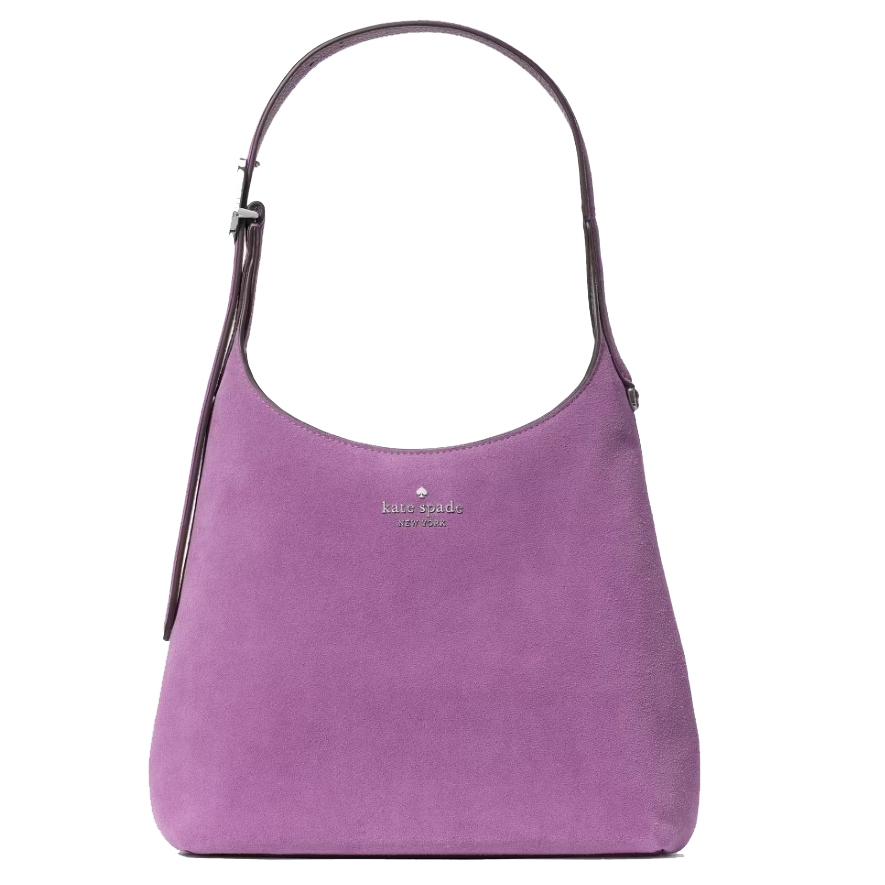 A purple suede Kate Spade New York handbag with a simple, curved design and an adjustable shoulder strap.