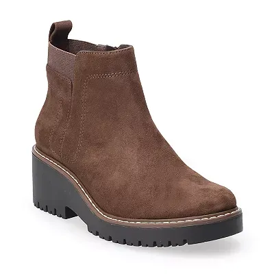 Brown suede ankle boots with a chunky heel, elastic side panels, and contrasting stitching along the welt.