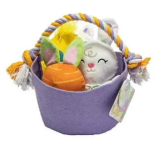 A purple basket with a rope handle contains plush toys, including a carrot, bunny, and chick, with a decorative tag attached.