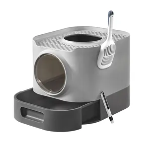 A multi-functional cat litter box with a top opening and a pull-out drawer for easy cleaning. It includes a built-in litter scoop and a side brush attachment.