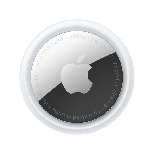 Apple AirTag, a small, circular device used for tracking items, featuring the Apple logo and text indicating it uses ultra-wideband and Bluetooth LE technology. Designed in California and assembled in China.