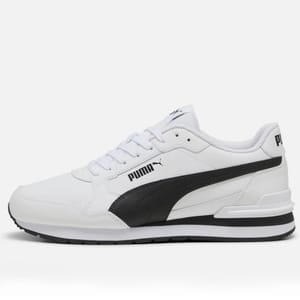 White Puma sneakers with a black side stripe and branding, featuring a mix of smooth upper construction and a chunky sole.