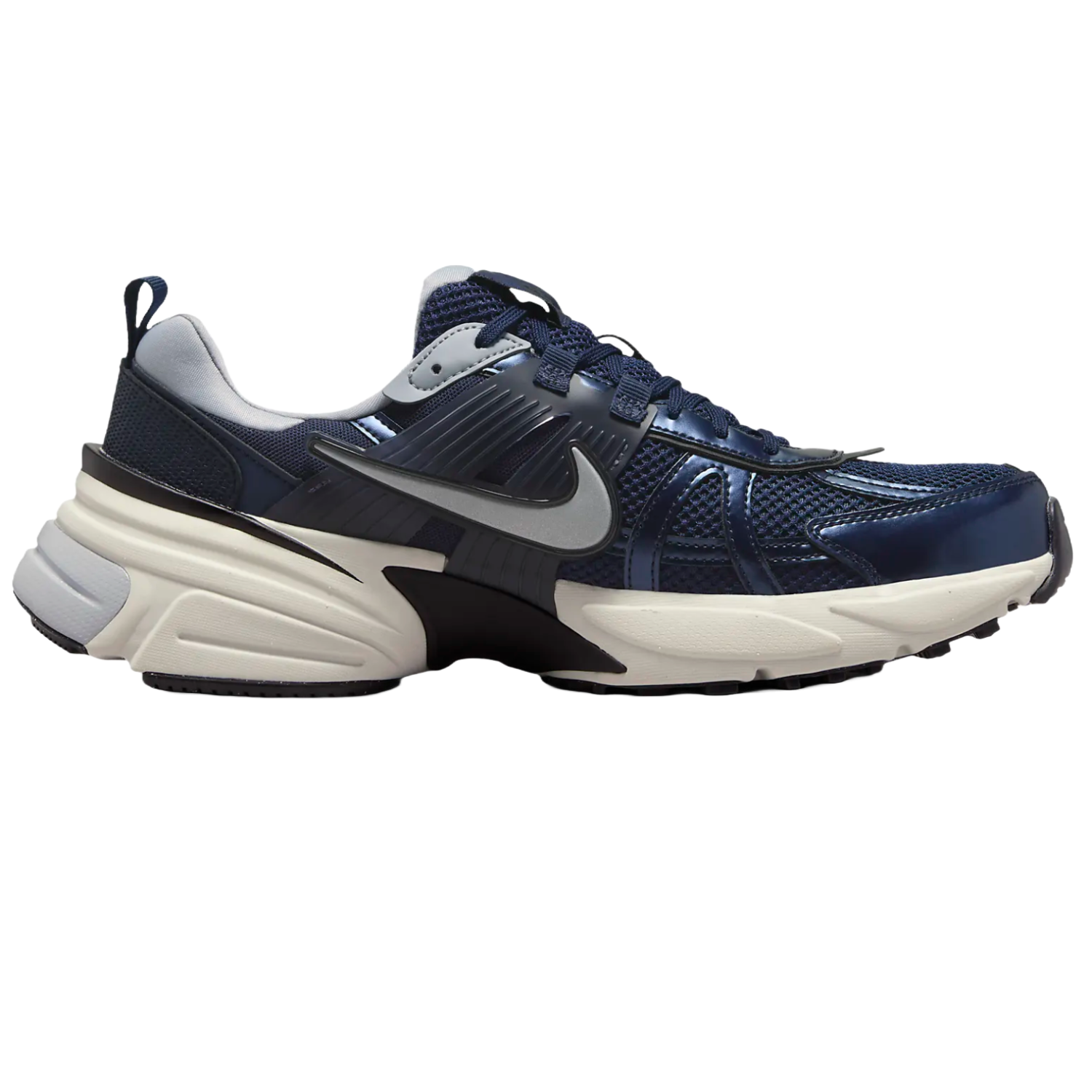 Navy blue Nike V2K sneakers with a chunky white sole, mesh upper, and a silver swoosh.