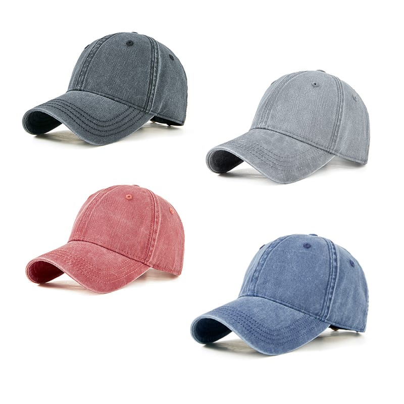 Four baseball caps in different shades of gray, blue, and red.