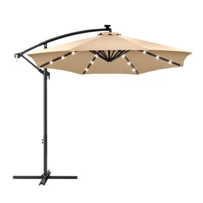 A beige cantilever patio umbrella with built-in LED lights, featuring a black metal frame and a crank mechanism for adjustment.