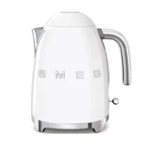 A white Smeg electric kettle with a retro design, featuring chrome accents and a prominent handle. The brand name \“SMEG\“ is displayed on the body.