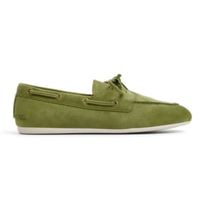 Green suede Sperry Slim Boat Shoes featuring a classic moccasin design, brown leather lacing, and white rubber soles for a casual, nautical look.