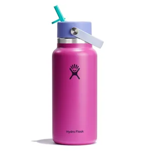 A pink Hydro Flask bottle with a purple lid, teal straw, and carrying handle is shown.