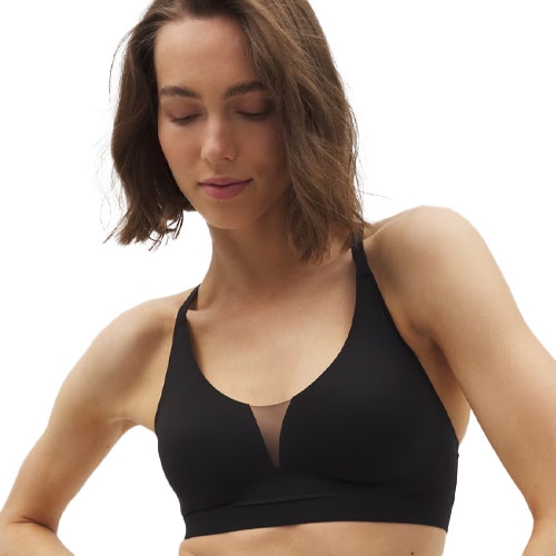 The Enbliss Racerback Bra features a black design with a deep V-neck and mesh insert. It provides support with a seamless look and racerback straps for comfort and flexibility.