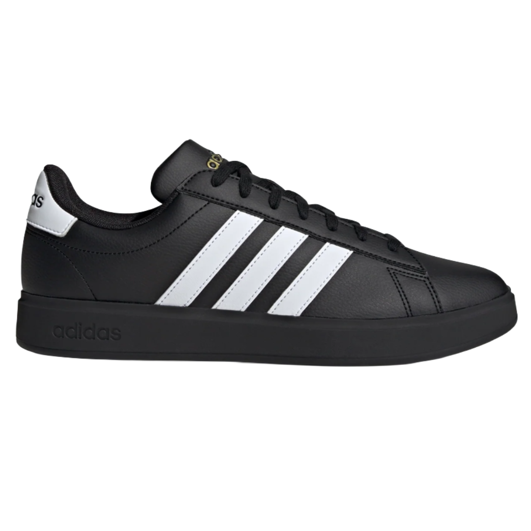 A black Adidas sneaker with three white stripes on the side, featuring a black sole and black laces.