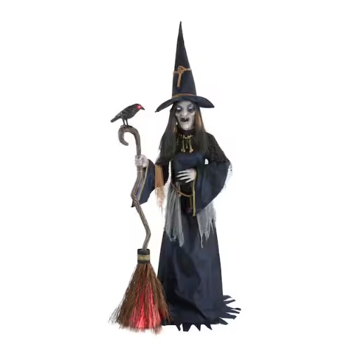 A life-sized animated witch decoration with a black hat, holding a broomstick with a red-lit base and a crow perched on top, featuring long dark hair and a creepy face, ideal for Halloween.