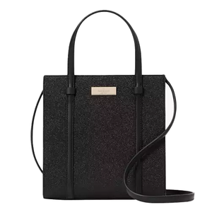Black Kate Spade Kenzie Small Tote featuring a structured design with top handles and a detachable shoulder strap. It has a rectangular shape with a subtle sheen and a metal logo plaque on the front.