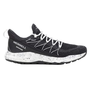 Merrell Bravada 2 Hiking Shoes feature a black and white knit design with a speckled white midsole, textured for traction. The shoe has a low profile, padded heel tab, and contrasting laces, suitable for outdoor use.