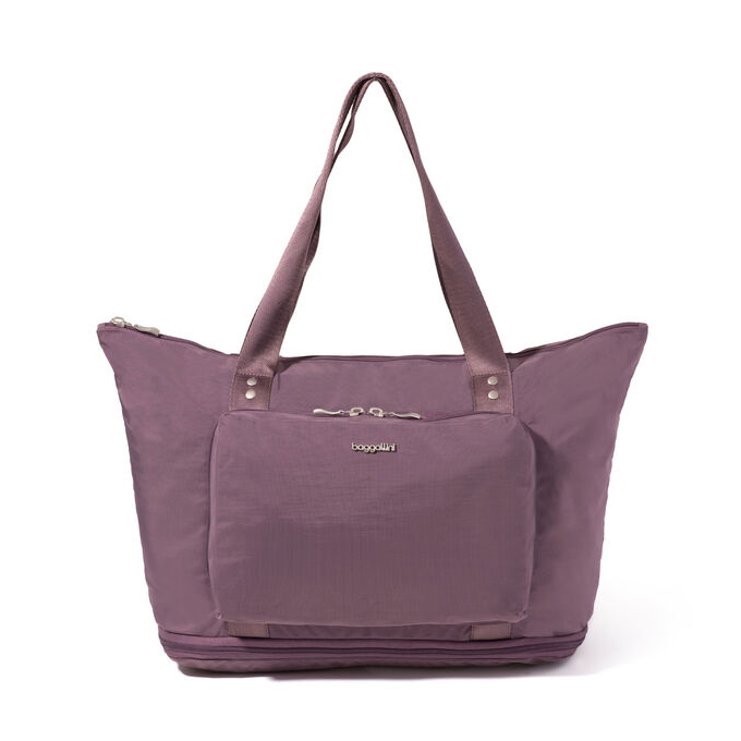A purple fabric tote bag with top handles, a front pocket, and a zipper closure.