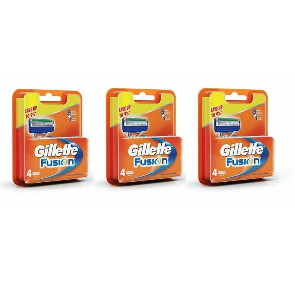 Three packages of Gillette Fusion razor blade cartridges, each containing four blades, with a promotion of up to 9% savings.