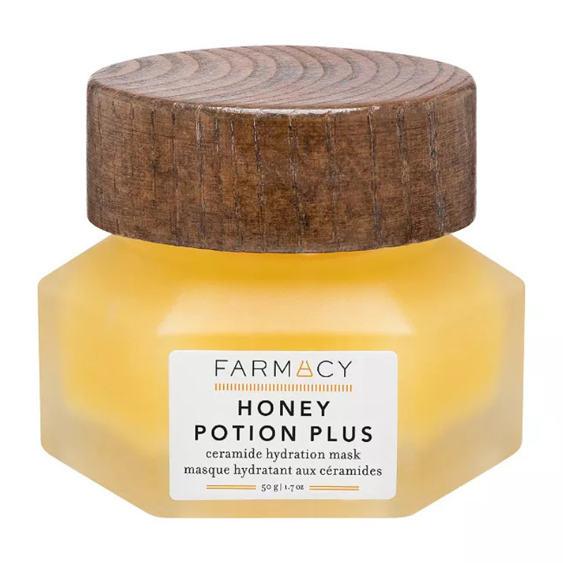 Farmacy Honey Potion Plus is a ceramide hydration mask with a honey-based formula in a hexagonal jar with a wooden lid, weighing 50g (1.7 oz).