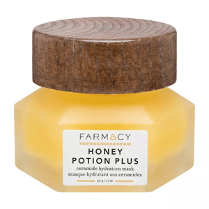 Farmacy Honey Potion Plus is a ceramide hydration mask with a honey-based formula in a hexagonal jar with a wooden lid, weighing 50g (1.7 oz).