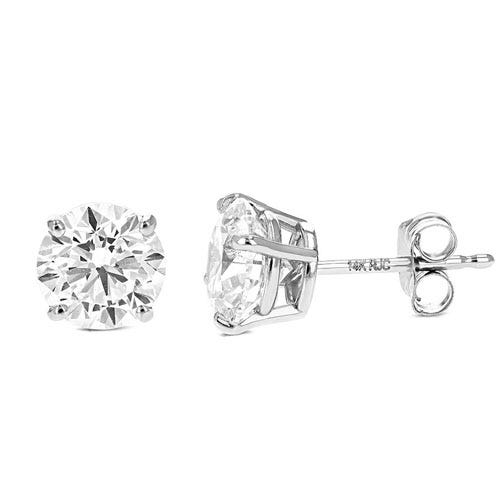 Pair of round-cut diamond stud earrings in white metal settings with butterfly backs.