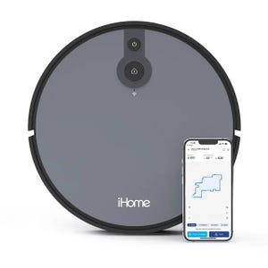 A robotic vacuum cleaner paired with a smartphone app displaying a cleaning map.