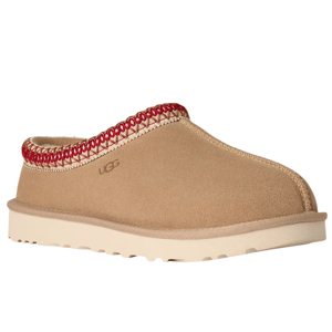 Tan suede slip-on shoe with a red-trimmed edge and a cream rubber sole. Brand logo is subtly embossed on the side.