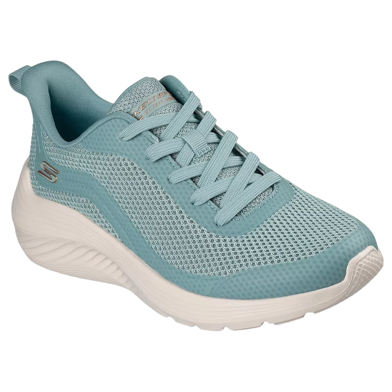 Light blue athletic sneaker with a white sole and mesh upper, featuring laces and a branded logo on the side.