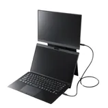 A compact, dual-screen laptop setup with an external monitor connected via a cable, positioned above the laptop.