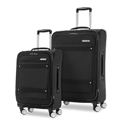 Two black wheeled suitcases, one larger and one smaller, with retractable handles and front zippered compartments.