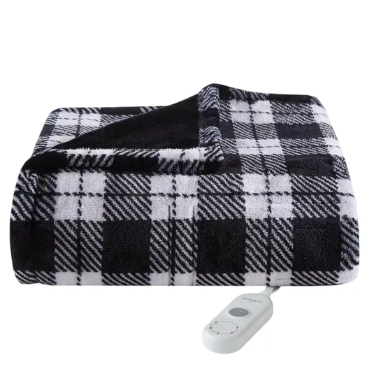 A black and white plaid electric blanket with a remote control.