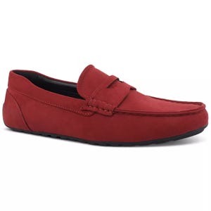 Red suede penny loafer with a penny strap and a low-profile, black rubber sole.