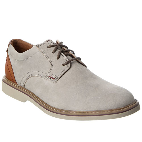 A casual men's lace-up shoe with light beige suede upper, brown leather accents on the heel, and a beige rubber sole.