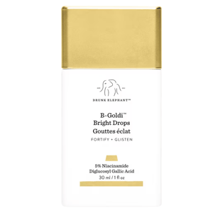 Drunk Elephant B-Goldi Bright Drops, 30 ml/1 fl oz, contains 5% Niacinamide and Diglucosyl Gallic Acid for fortifying and glistening the skin.