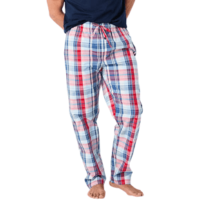Plaid pajama pants in red, blue, and white with a drawstring waist, worn by a person barefoot.
