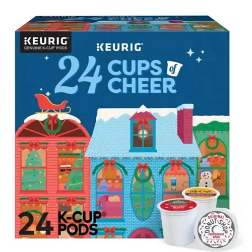 Keurig \“24 Cups of Cheer\“ box containing 24 K-Cup pods with a festive holiday-themed design.