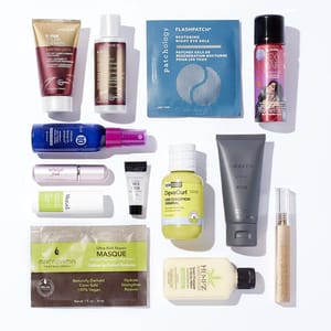 A collection of beauty and skincare products, including face masks, hair treatments, moisturizers, conditioners, and a deodorant spray. Brands shown are Josie, Patchology, Macadamia, and DevaCurl among others.