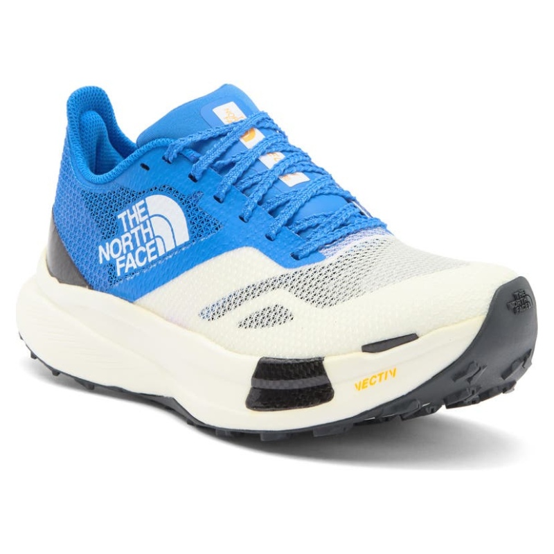 The North Face Summit Vectiv Pro Trail Running Shoes feature a blue and white mesh upper with black accents, a cushioned sole, and a rugged outsole designed for trail performance.