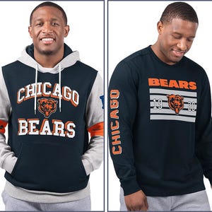 Two Chicago Bears-themed items: a hoodie with a front logo and \“Chicago Bears\“ text, and a black long-sleeve tee featuring a side stripe and a bear logo with years.