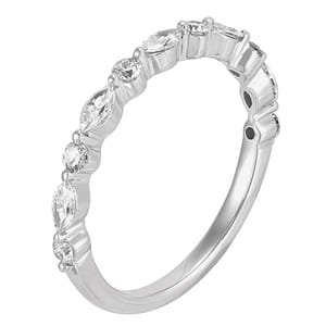 Elegant white gold diamond wedding band featuring a variety of diamond shapes, including round and marquise cuts, set in a delicate prong setting, creating a continuous sparkle around the ring.
