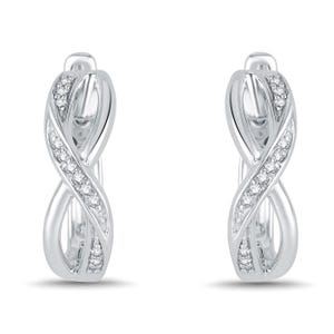 Silver hoop earrings with a twisted design, featuring embedded small, round diamonds.