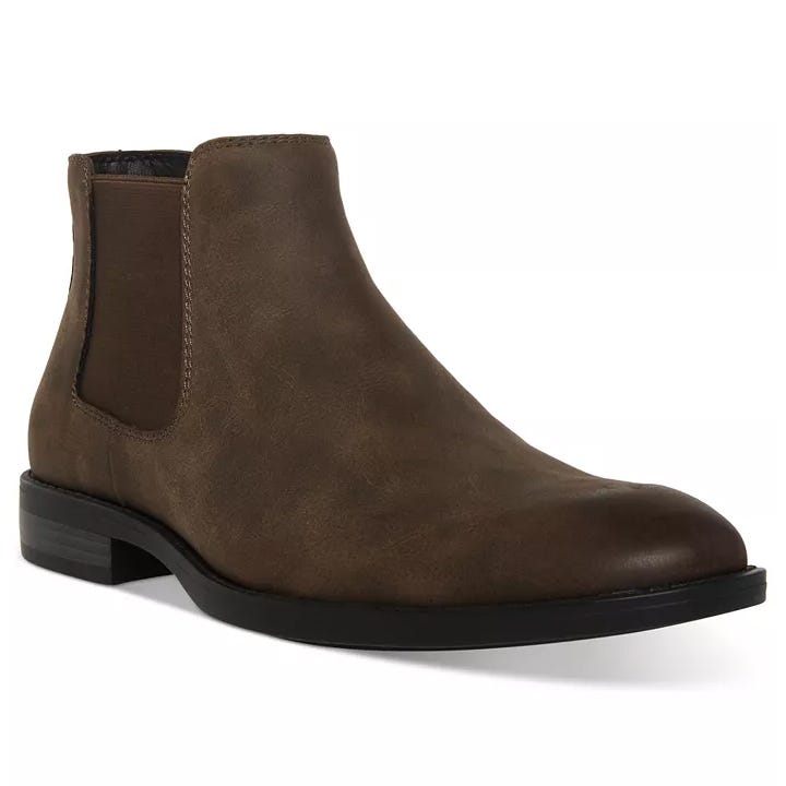 Brown Chelsea boot with a round toe, elastic side panels, and a low stacked heel.