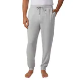 Light gray sweatpants with an adjustable drawstring waist and cuffed ankles, worn by a person with bare feet.